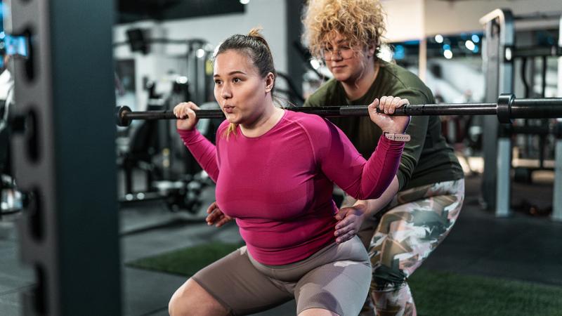 Two women weightlifting