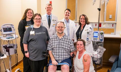 A photo of Toby with his family and MUHC faculty.