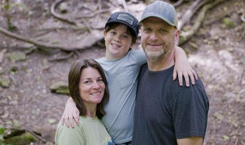 Joni with her husband and son.